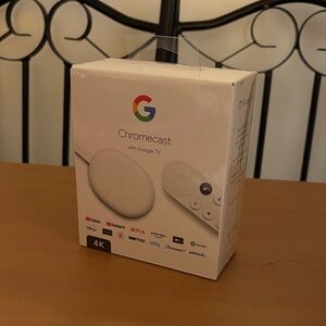 google Chromecast with Google TV in white and multicolor logo
